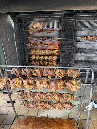 Foto Rostisseria de Pollos